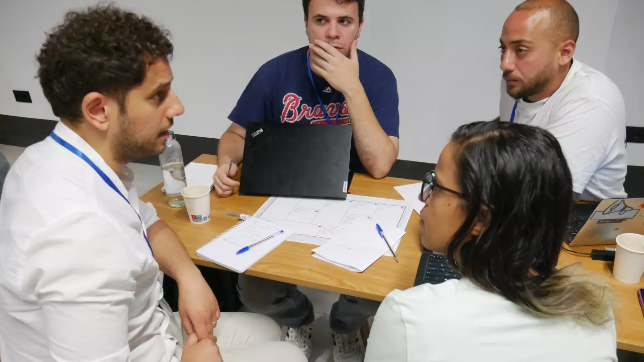 Team working together during an AI training session